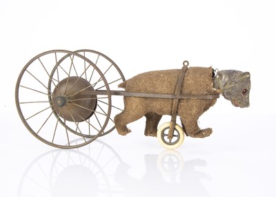 Lot 515 - An early German pull-along bear bell toy circa 1908