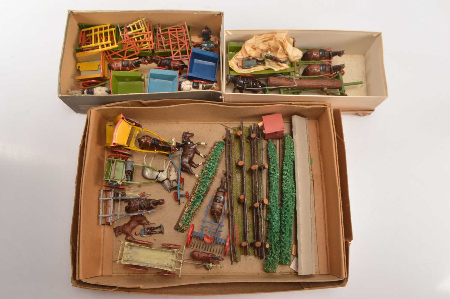 Lot 720 - large collection of Britains pre-war Horse Drawn Farm Carts and Equipment with Farmers  and various items of Fencing (11 carts and wagons and other items)