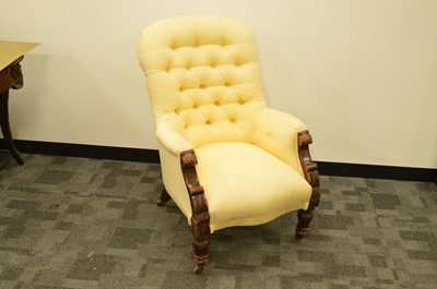 Lot 427 - A 19th century mahogany framed, button back low armchair