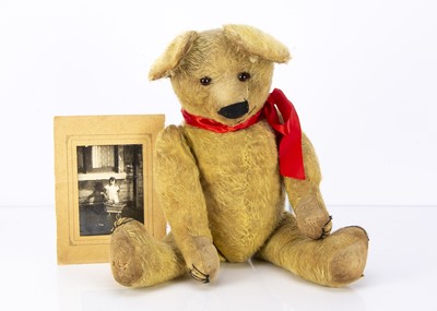 Lot 561 - A Chad Valley 1920s Smiler Teddy Bear with original photograph
