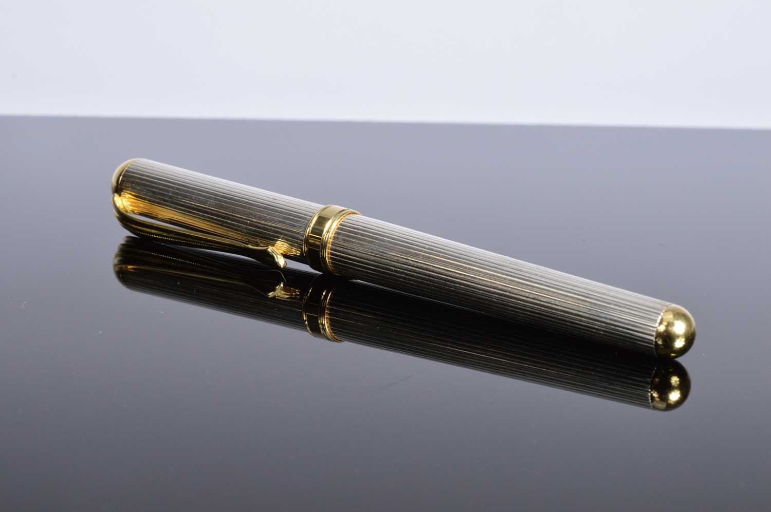 Lot 406 - A modern silver fountain pen from Asprey