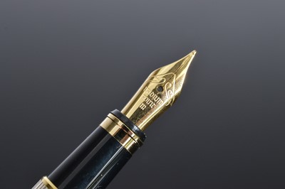 Lot 406 - A modern silver fountain pen from Asprey