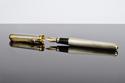 Lot 406 - A modern silver fountain pen from Asprey