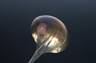 Lot 453 - An Edwardian silver soup ladle by JR
