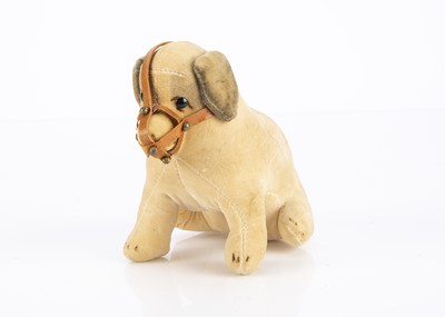 Lot 583 - A small early German velvet puppy in muzzle 1910-20