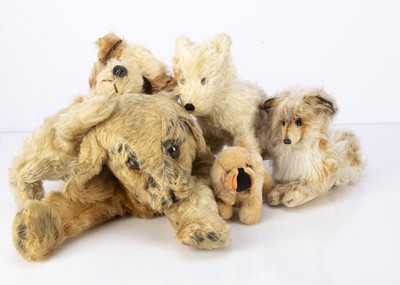 Lot 595 - Five post-war soft toy dogs