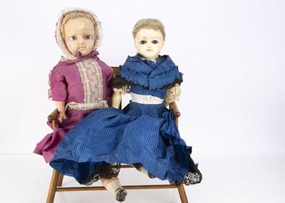 Lot 283 - A late 19th century German wax over composition doll with sleeping eyes