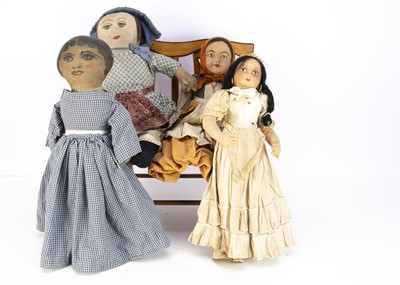 Lot 285 - Four cloth dolls