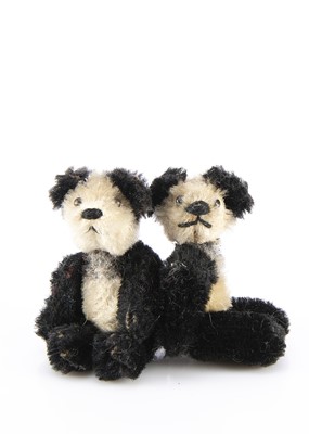 Lot 684 - Two post-war miniature Schuco Panda Teddy Bears