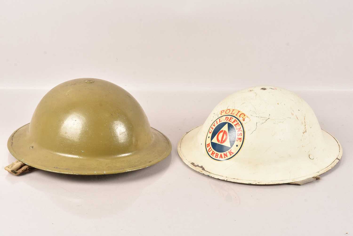 Lot 202 - A Police Civil Defence Burbank Brodie Helmet