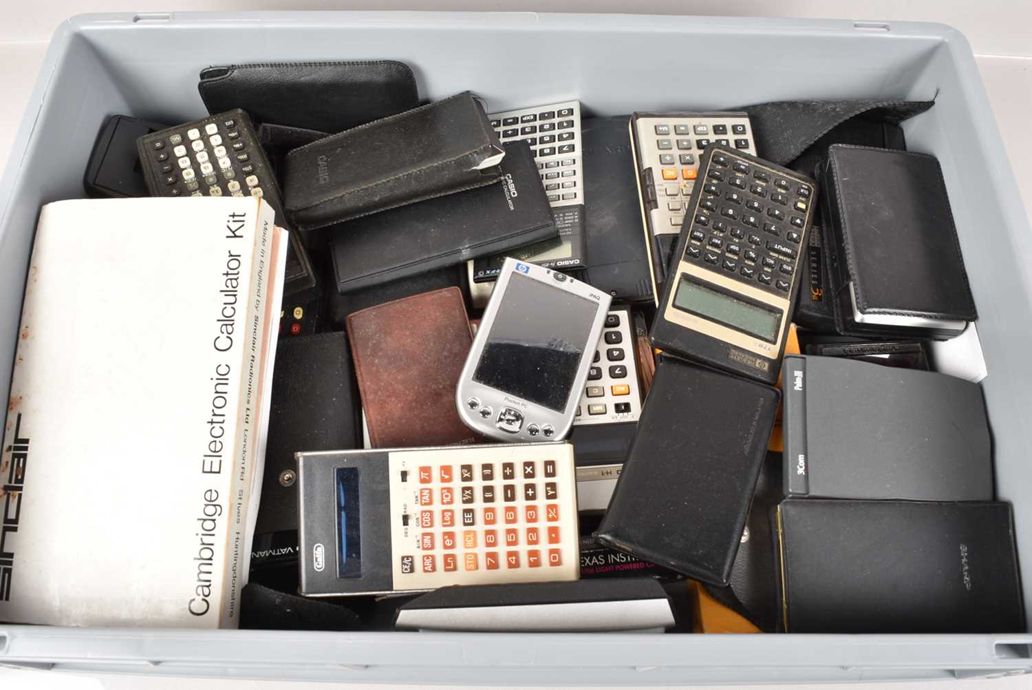 Lot 838 - An assortment of Pocket Calculators and Computers