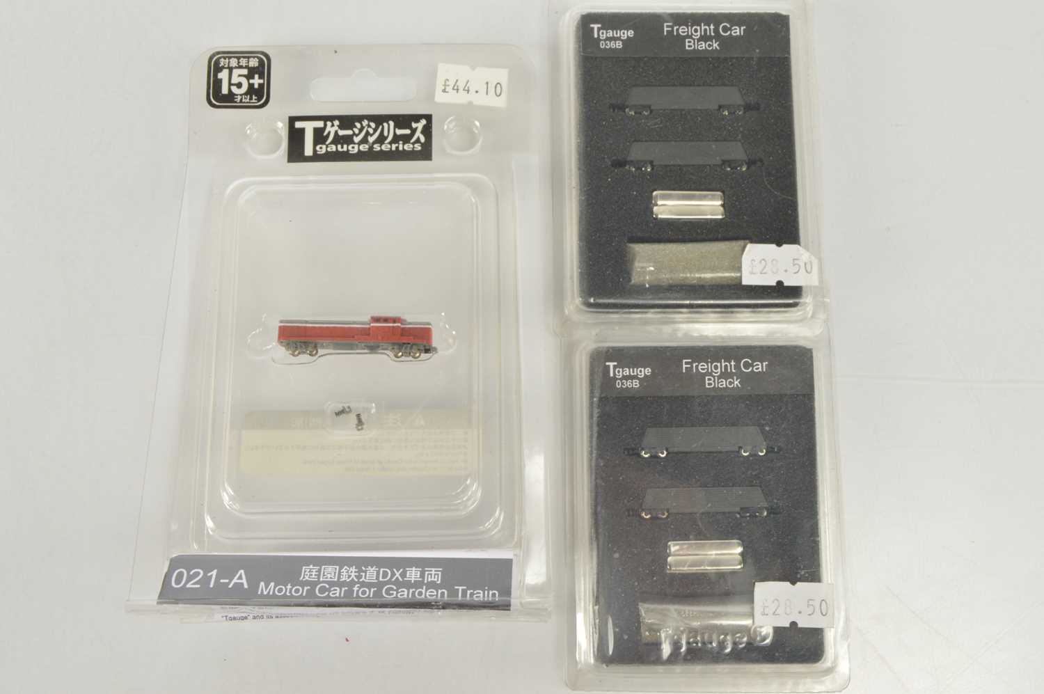 Lot 8 - T Gauge JNR Diesel Locomotive and Freight Car Packs (3)
