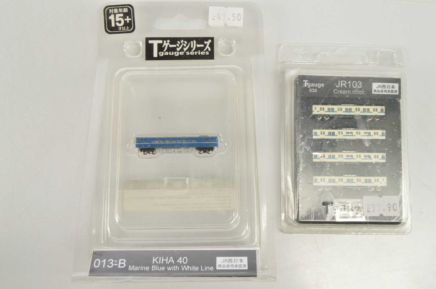 Lot 9 - T Gauge JNR Diesel Locomotive Rail Car and Coach Pack (2)