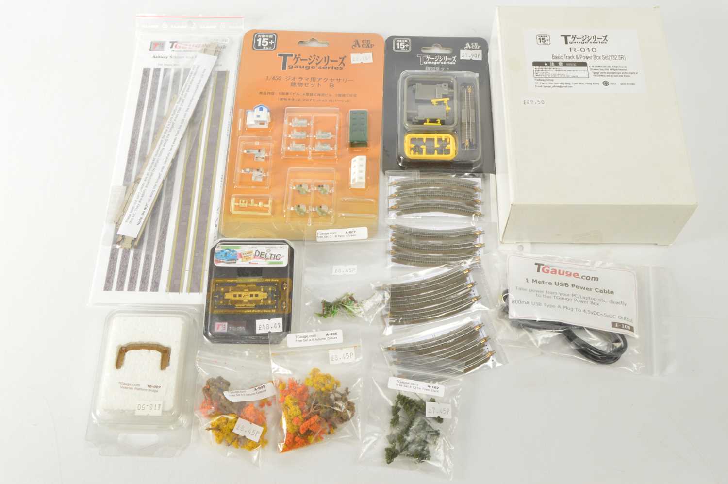 Lot 10 - T Gauge Track and Power Box Set and T Gauge Accessories, (15)