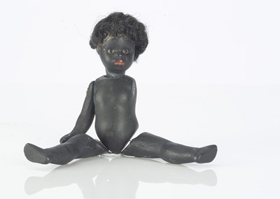 Lot 788 - An all-bisque black dolls’ house doll
