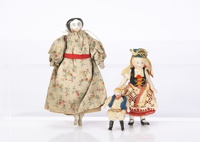 Lot 790 - Three dolls’ house dolls