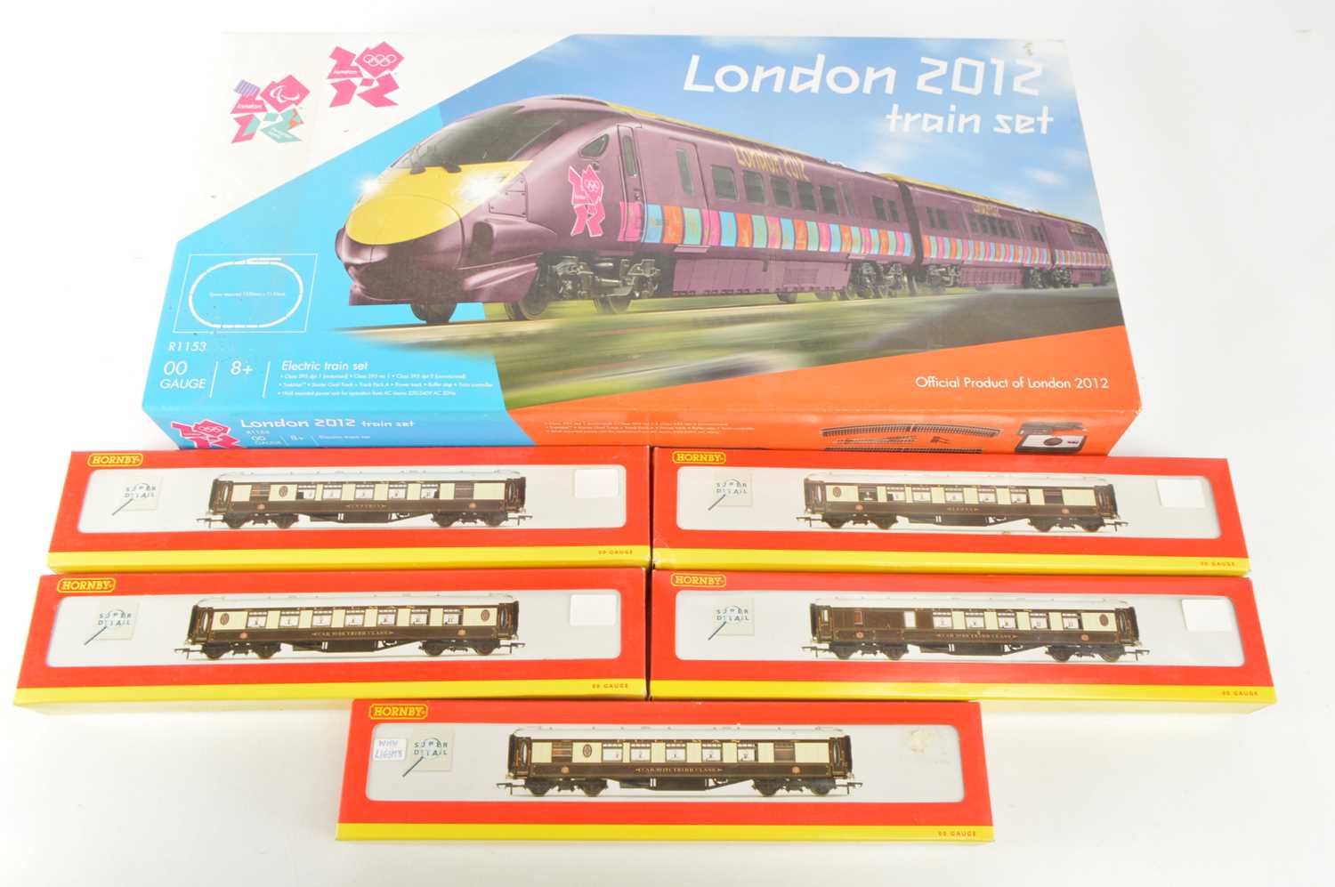 Lot 72 - Hornby 00 Gauge boxed London 2012 Olympics Train Set and five brown and cream Pullman Cars (6)