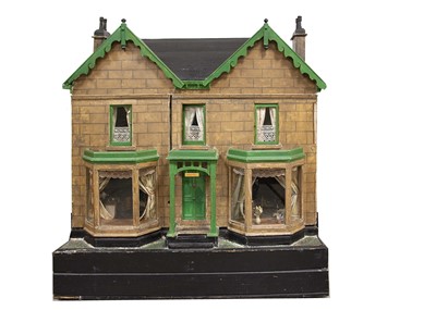 Lot 809 - A large late 19th century painted wooden dolls' house