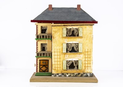 Lot 815 - A German 1920-30s wooden dolls’ house with elevator