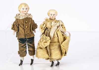 Lot 821 - Two larger scale dolls’ house bisque shoulder head dolls