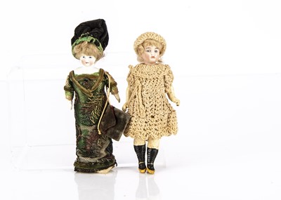 Lot 827 - Two bisque headed dolls’ house dolls