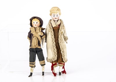 Lot 828 - An unusual bisque shoulder head dolls’ house doll