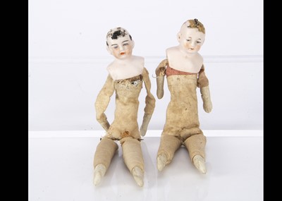 Lot 839 - Two bisque shoulder-head dolls’ house dolls