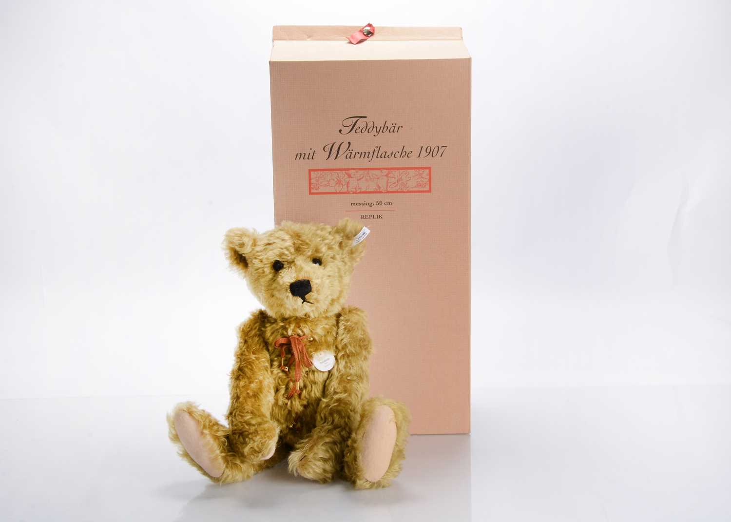 Lot 1 - A Steiff limited edition hot water bottle replica 1907 teddy bear