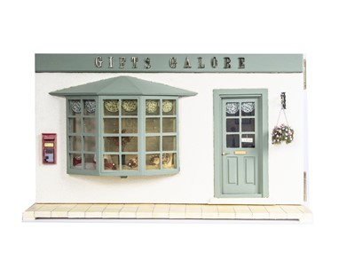Lot 845 - A modern miniaturist dolls’ house single room Gifts Galore shop