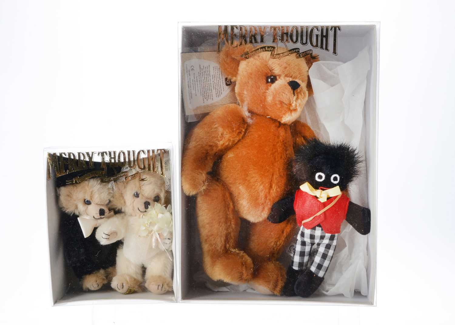 Lot 38 - A Merrythought bear with golly set