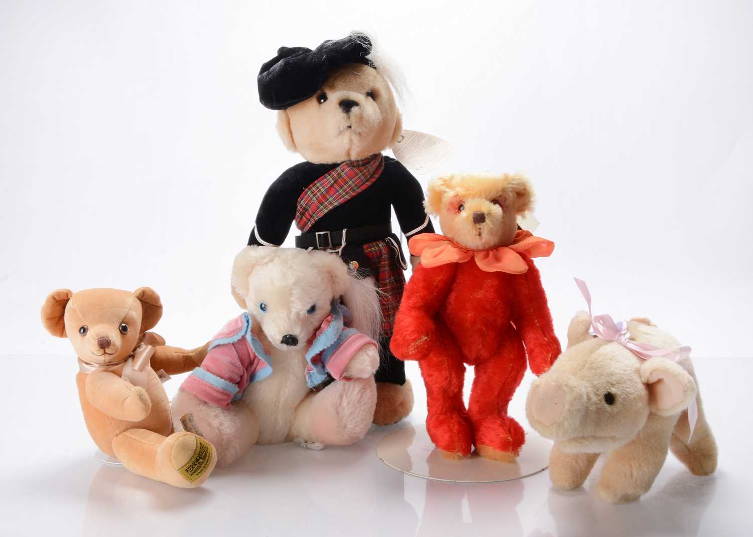 Lot 96 - Five Merrythought teddy bears / soft toys