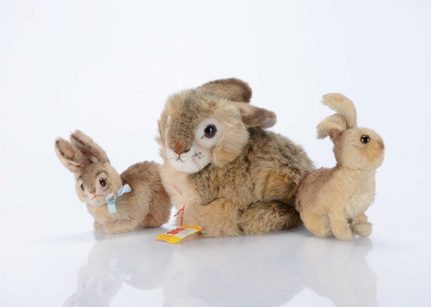 Lot 142 - Three Steiff post-war rabbits,