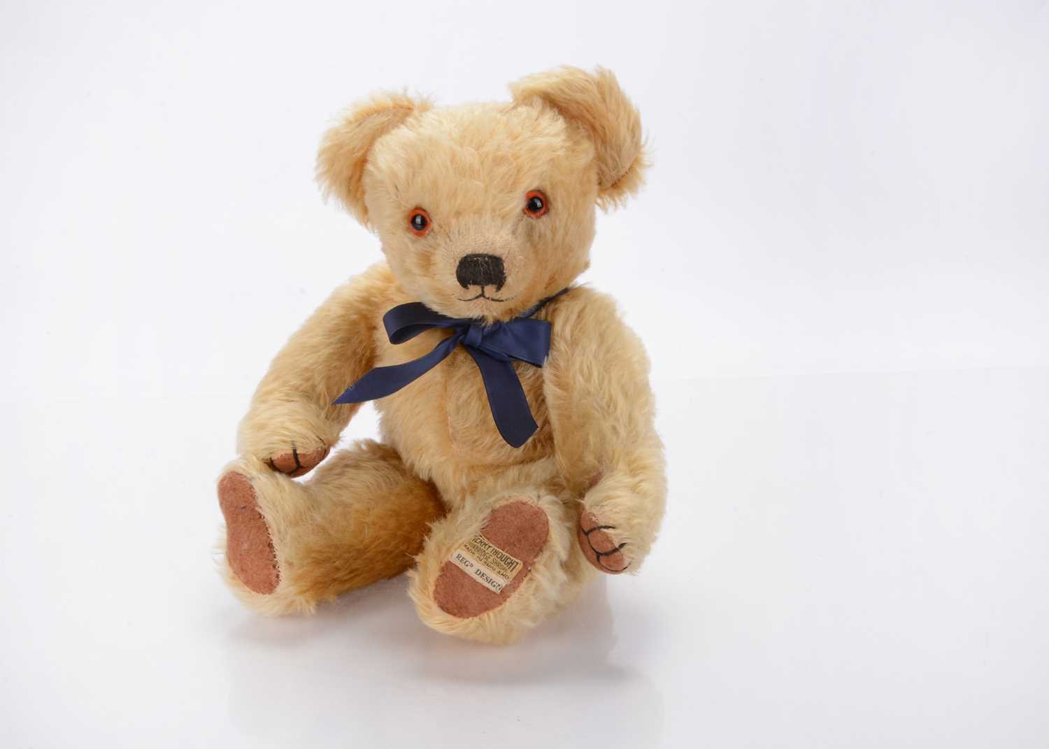 Lot 229 - A 1930s Merrythought pyjama case teddy bear