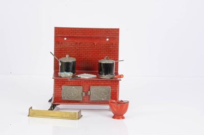 Lot 879 - A Brimtoy lithographed tinplate large scale dolls’ house range cooker