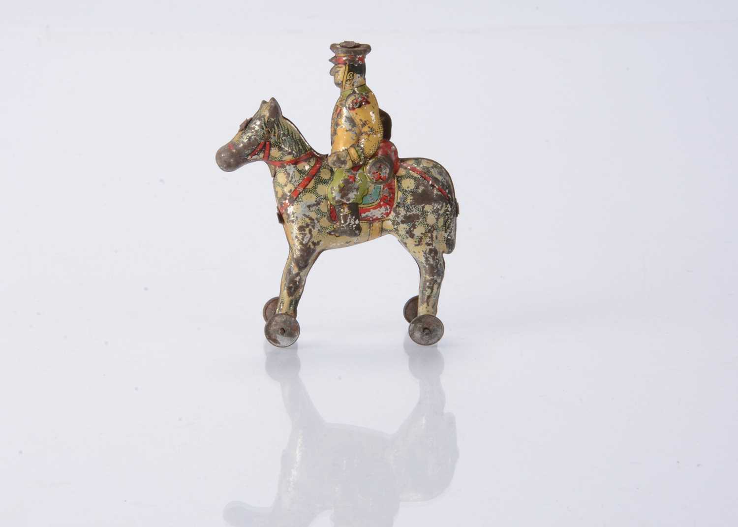 Lot 397 - A Japanese Penny Toy Japanese cavalry soldier