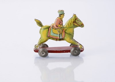 Lot 403 - A Japanese Penny Toy Japanese cavalry soldier