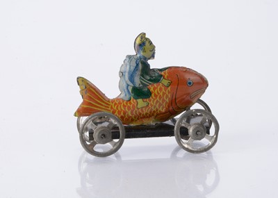 Lot 408 - A Japanese Penny Toy of Kink? riding a carp