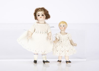 Lot 894 - Two German all-bisque dolls’ house dolls