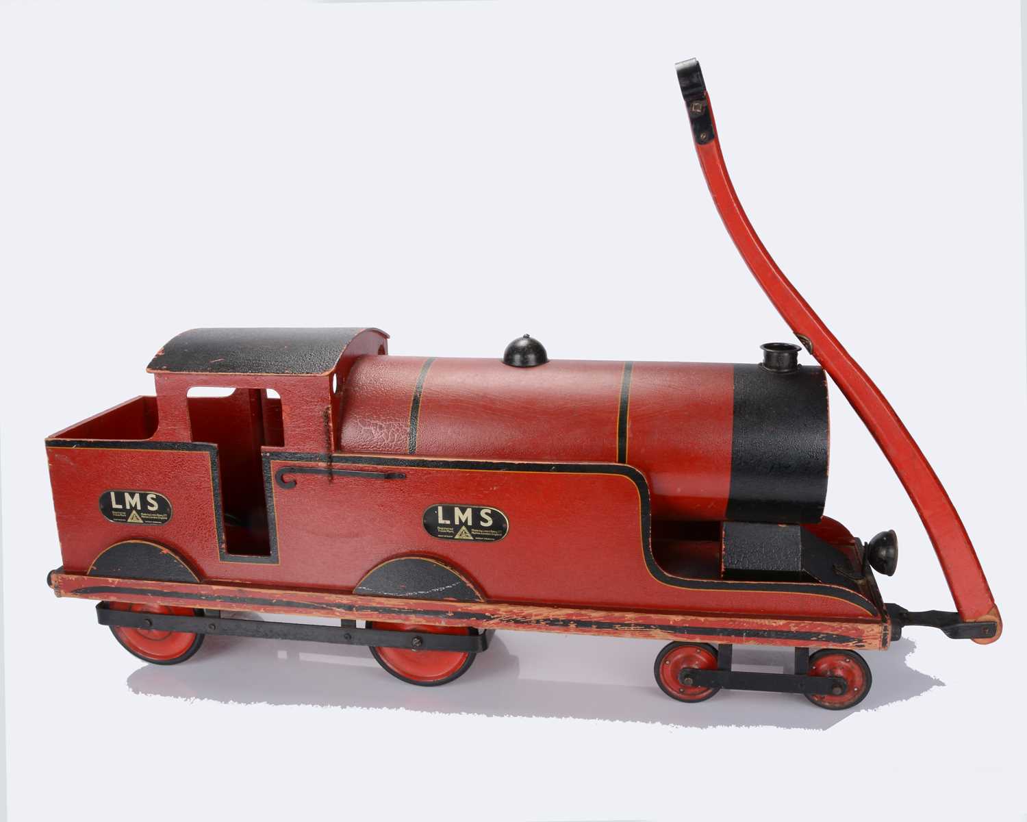 Lot 525 - A large 1930s Triang wooden ride-on LMS tank locomotive