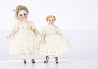 Lot 898 - Two all-bisque dolls’ house dolls