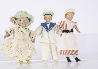 Lot 902 - Three German bisque shoulder head dolls’ house dolls