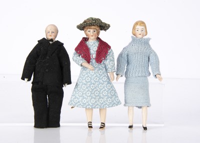 Lot 904 - Three German bisque shoulder-head dolls’ house dolls