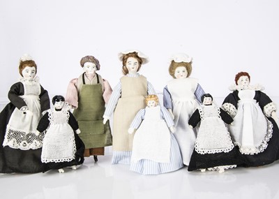 Lot 905 - Nine German bisque and china shoulder head dolls’ house servants