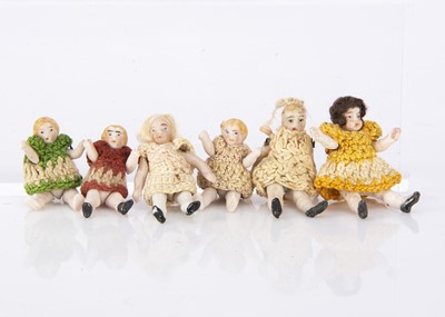 Lot 908 - Six Horn all-bisque miniature dolls’ house dolls