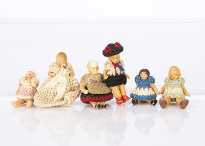 Lot 912 - Six German painted bisque tiny dolls’ house dolls