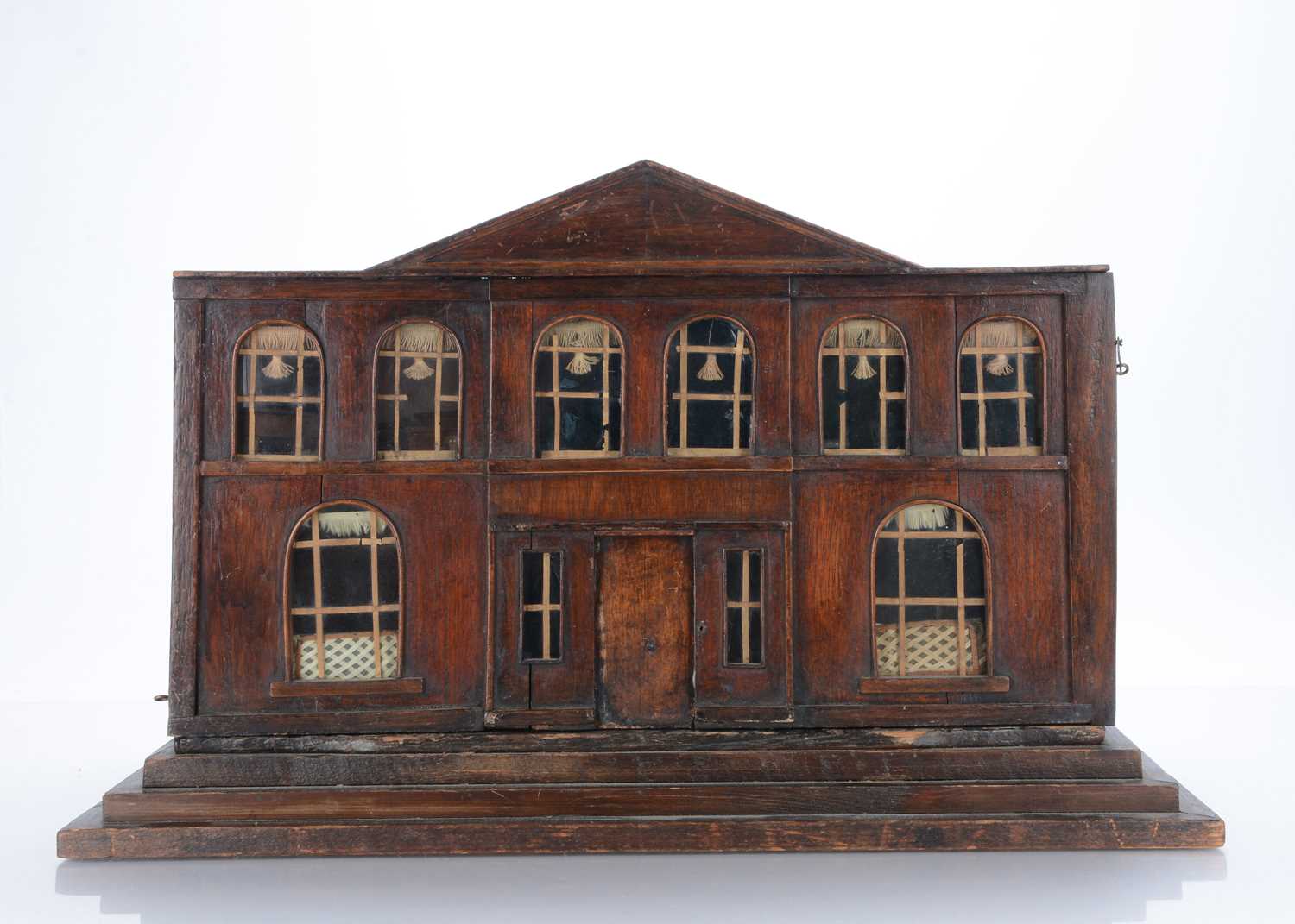 Lot 724 - An early 19th century small Palladian style stained wood dolls’ house