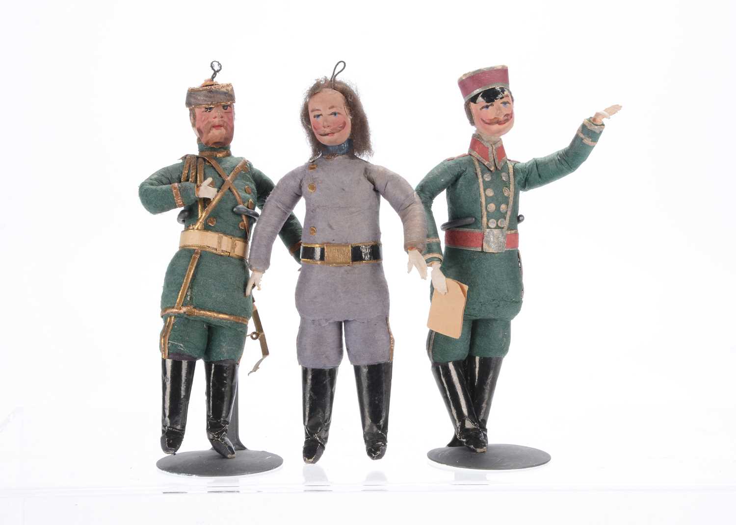 Lot 906 - Three German dolls’ house size soldier puppets
