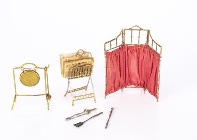 Lot 938 - A German gilt dolls’ house items