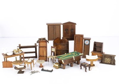 Lot 946 - A quantity of wooden dolls’ house furniture