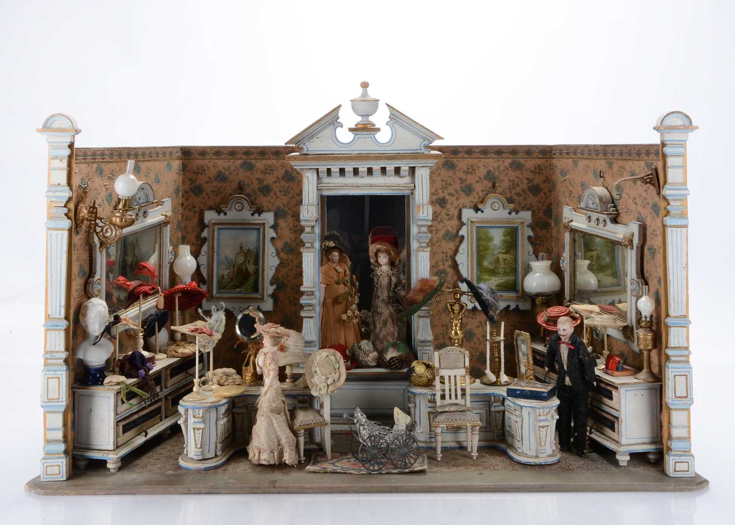 Lot 1080 - A rare late 19th century Gottschalk wooden dolls’ house room millinery shop
